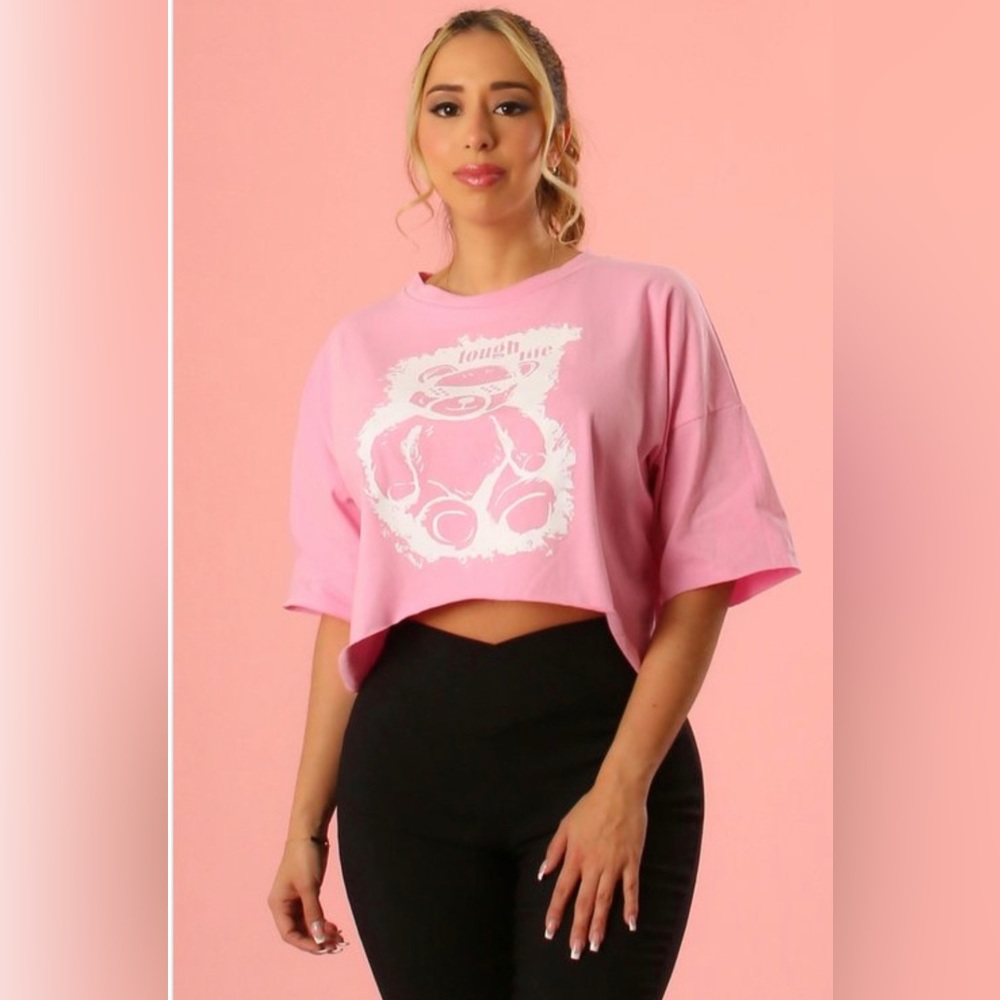 Pink graphic crop top with bear design